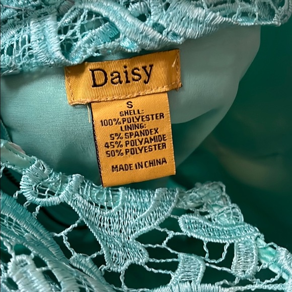 Light turquoise lace dress with gold zipper - Picture 5 of 5